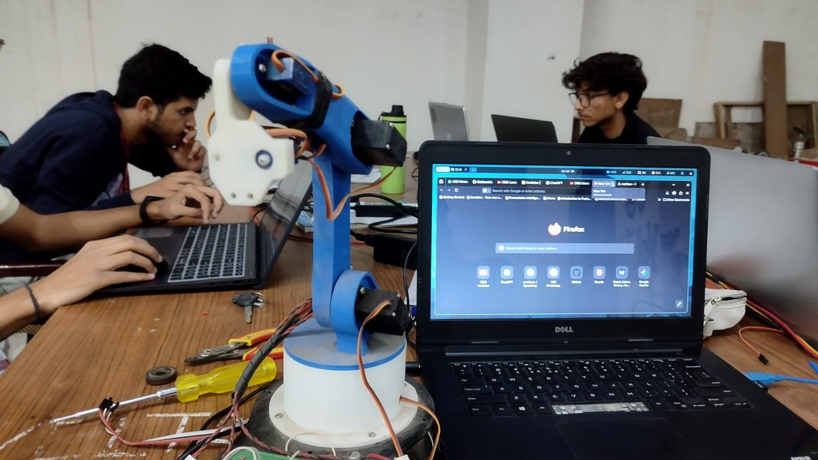 Robotics prototype being tested at a workbench
